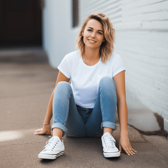 woman with white top and jeans with sneakers