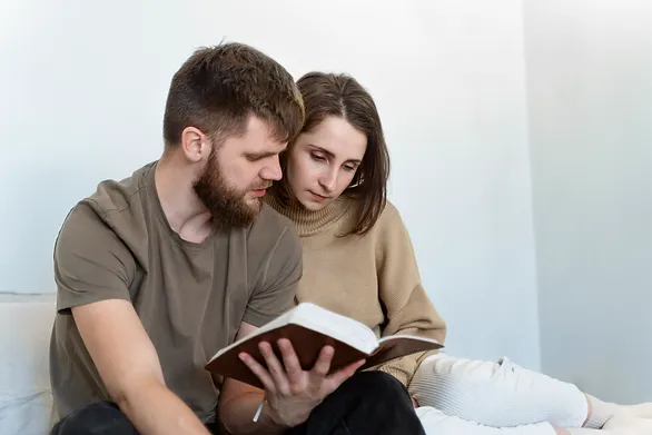 wife and husband bible verses - wife and husband reading the Bible