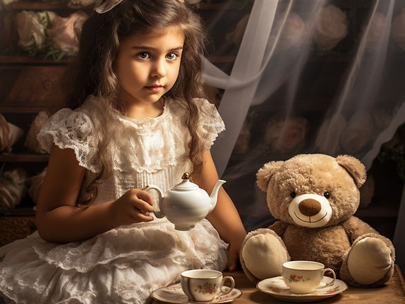 child's tea party ideas - young girl with tea and a teddy bear