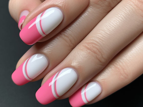 Modern French Manicure Twist: A contemporary take on the French manicure is showcased here. The tips of these medium-length, neatly manicured nails are painted in hot pink, offering a modern and stylish twist on a classic design.