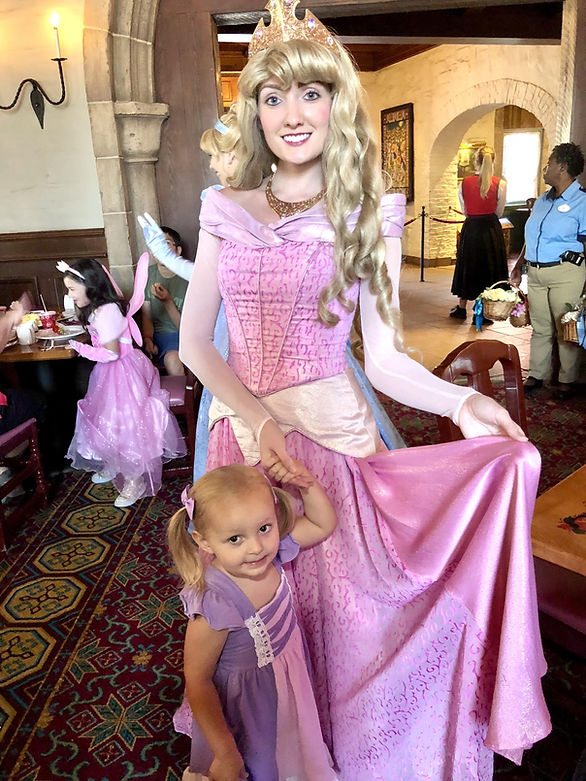 princess and little girl at Epcot