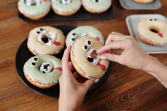 doughnut with fangs and icing blood -  simple halloween treat ideas