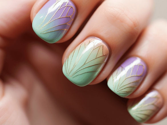 A soft gradient of spring colors as the base, with delicate butterfly wing details on the accent nails, in colors that complement the gradient. Ombre look.