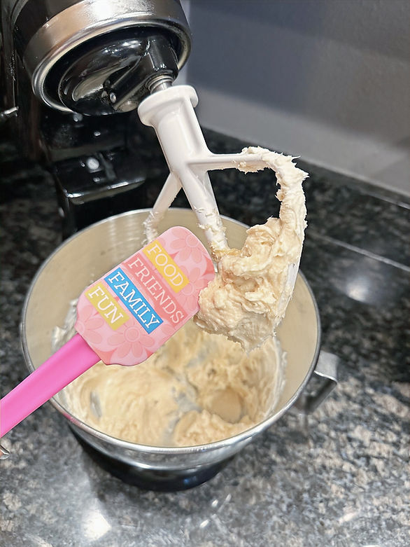 Valentine cookie dough dip - ingredients mixed, spatula on the side