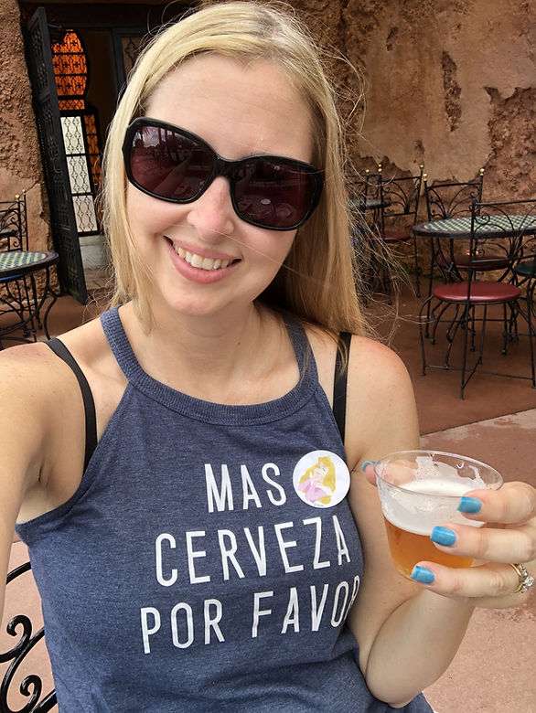 Grabbing a quick beer to sample in the Mexico pavilion at Epcot