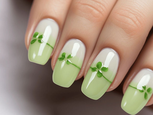 white base, light green tip with clover and line across middle - st. patrick's day nails