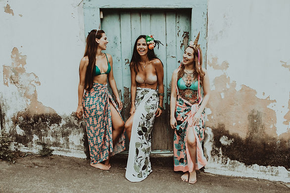 friend photoshoot - three girls in bikini tops and skirts