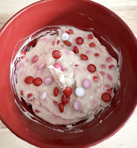 Valentine cookie dough dip with white, pink and red, M&ms