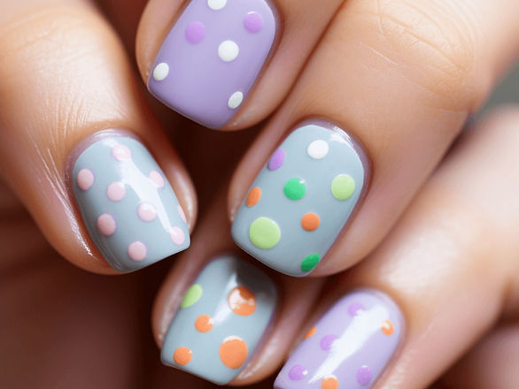 multi-colored dots on pastel nails