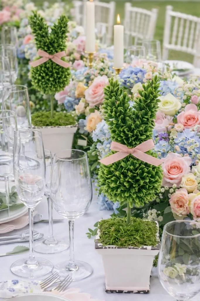 Festive Easter tablescape featuring a floral centerpiece and coordinated place settings.