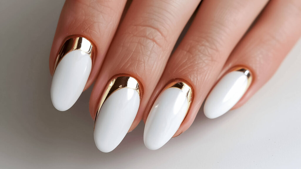 Simple white nails with pretty golden lines going around the tips or at the base in the shape of half-moons. This simple, basic design is made up of clean lines and stylish simplicity, so it can be used for any event. 