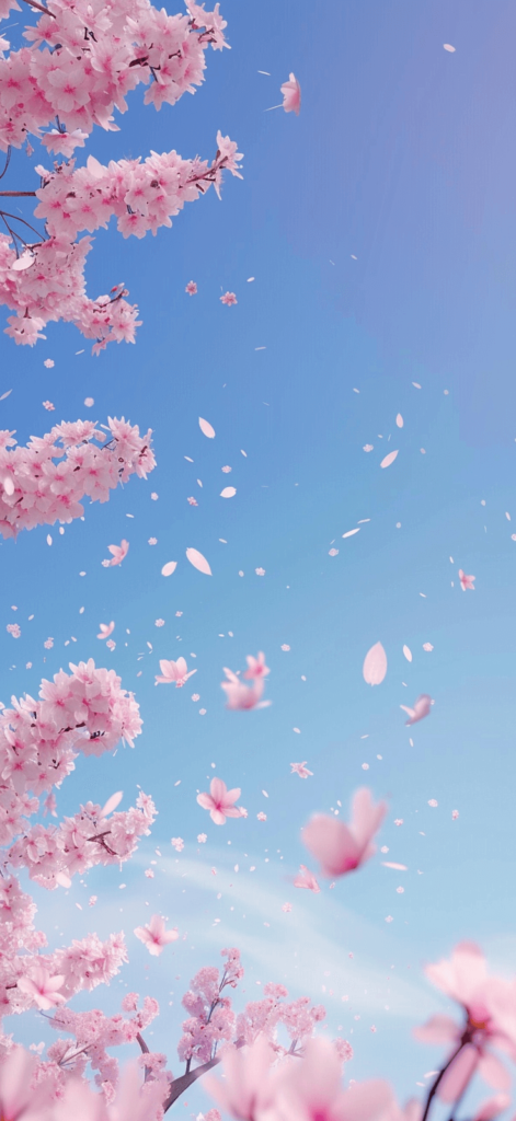 Cherry Blossoms: Delicate pink cherry blossoms against a clear blue sky, symbolizing the beauty of nature in spring.
