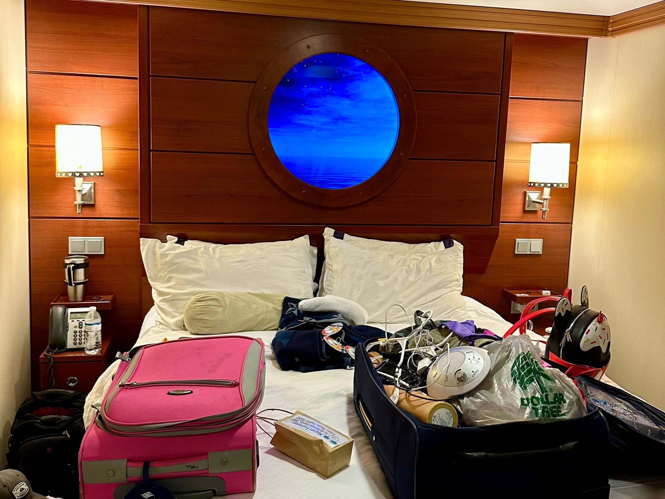 two suitcases on the bed, the one on the right is open, then one of the left is closed