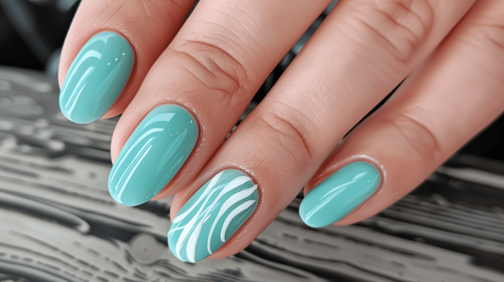 aqua nails with wavy white lines on ring finger nail