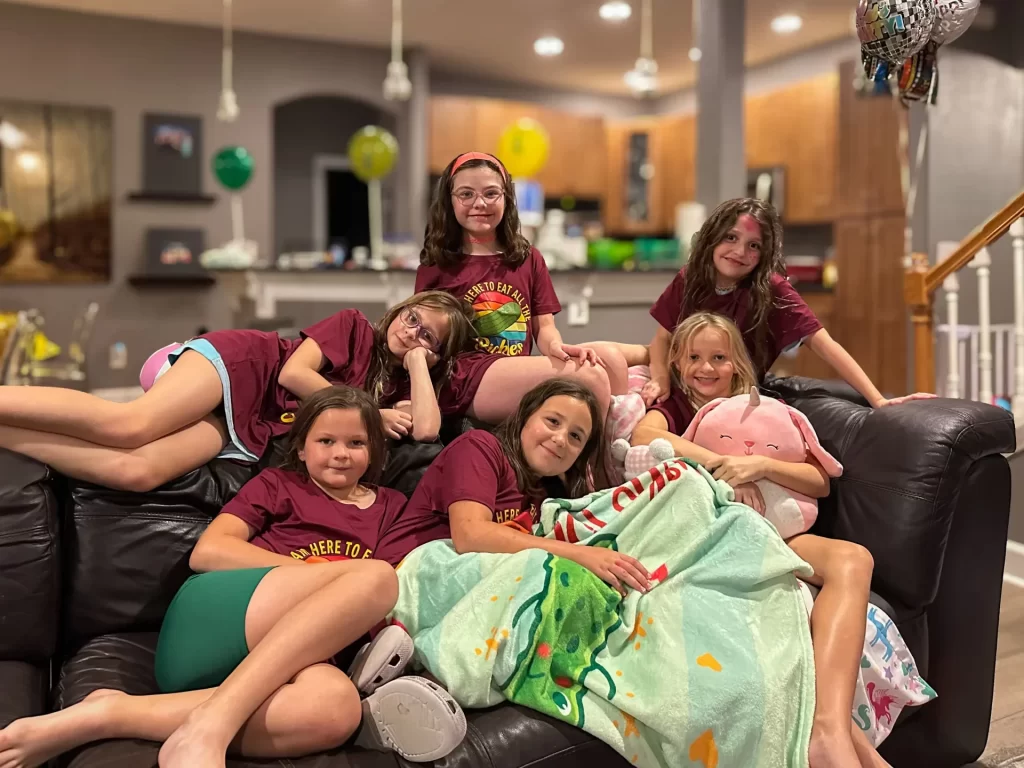 girls all posing from a party