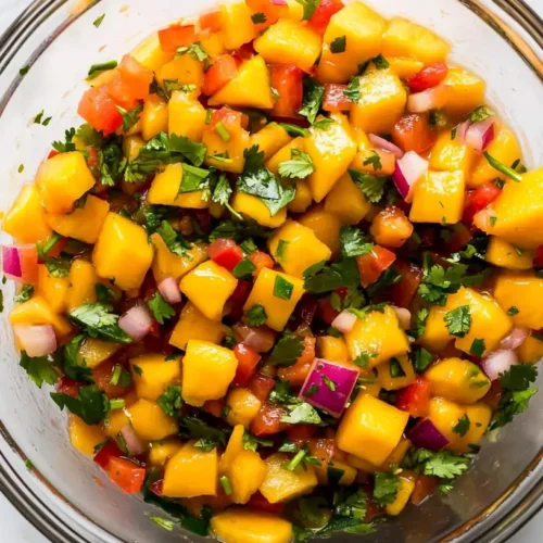 mango salsa in a glass dish