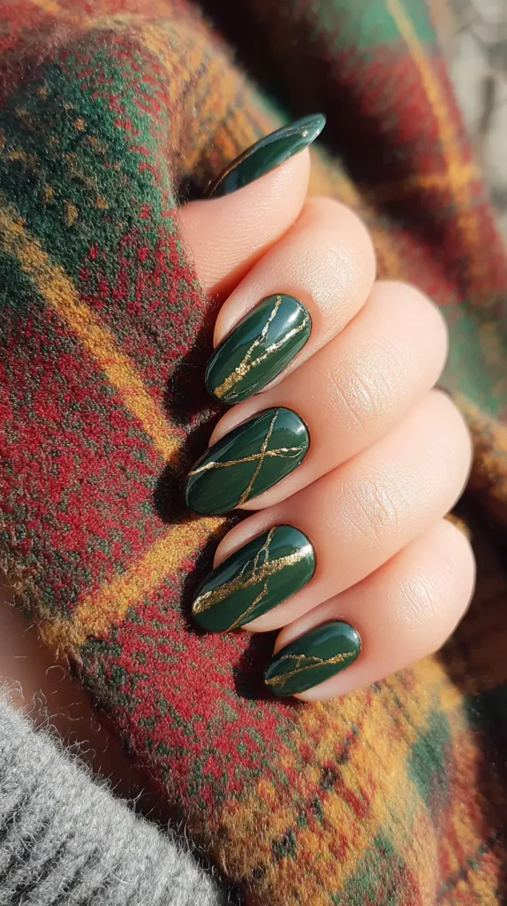dark green nails with gold foil autumn accents