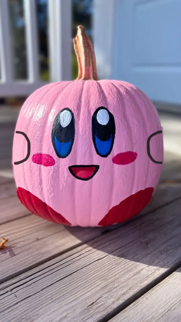 kirby painted on to a Halloween pumpkin