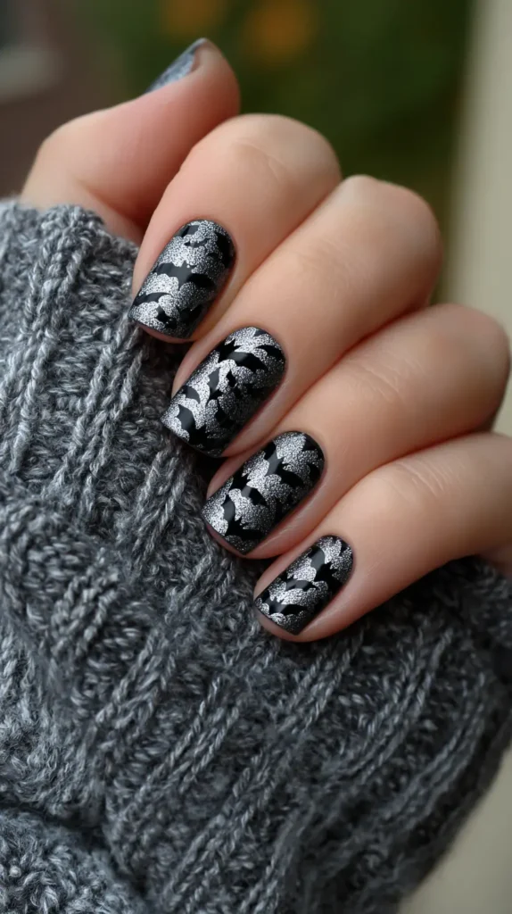 bats painted on a silver base, manicure