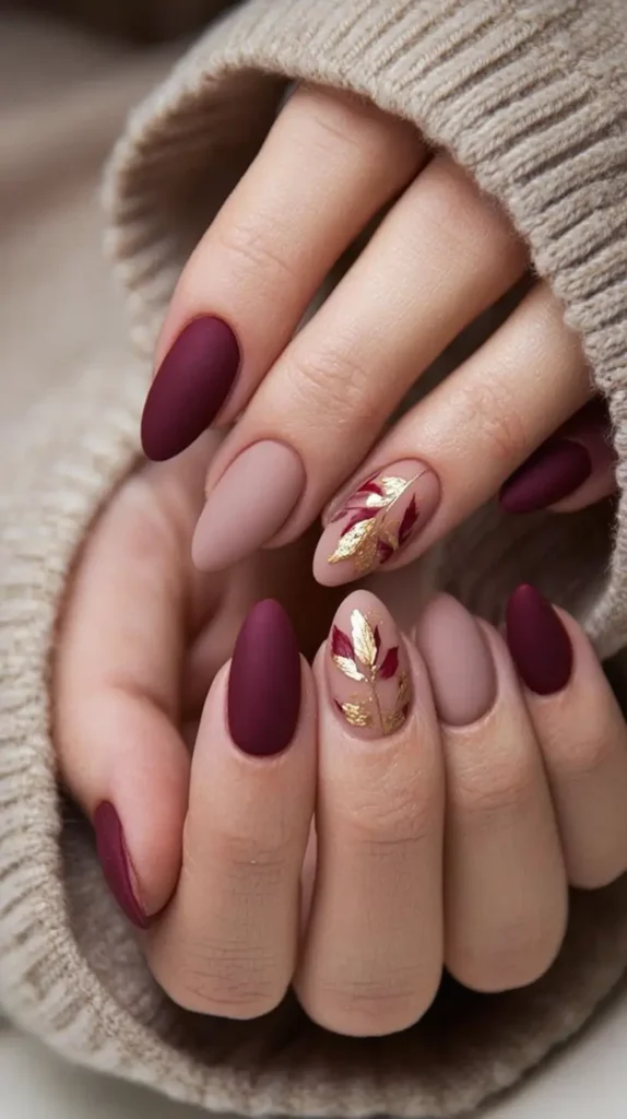 fall leaf design on a female manicure