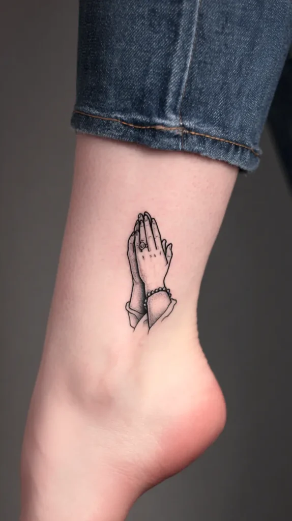 praying hands ankle tattoo