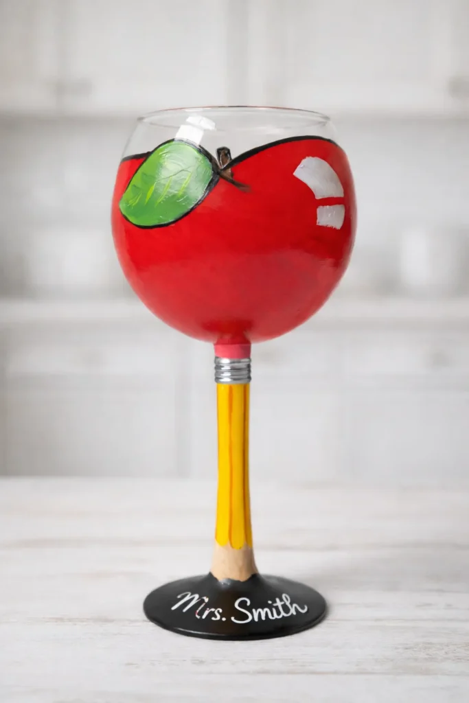 apple, teacher, wine glass