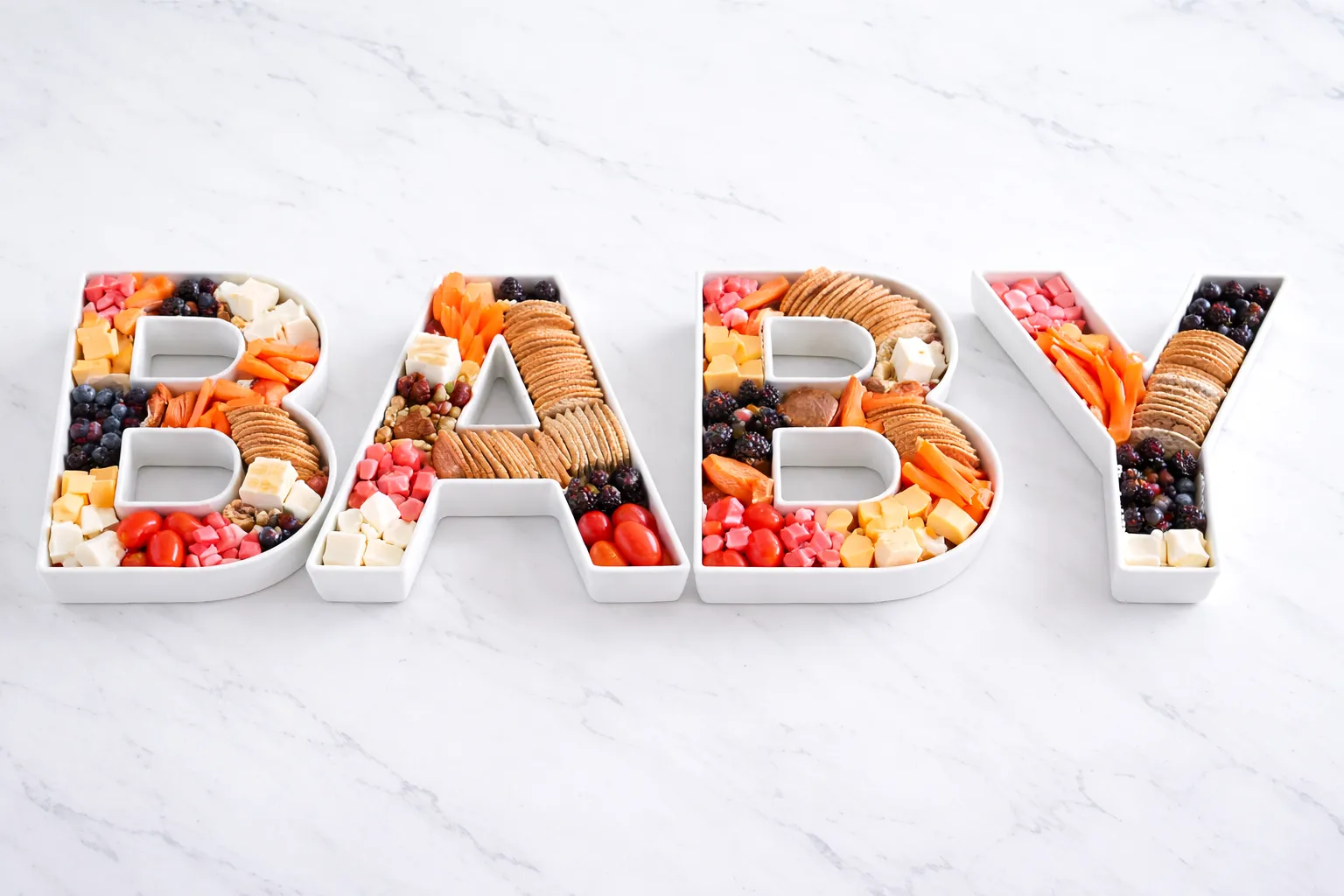 baby letter bowls spelling baby, filled with charcuterie
