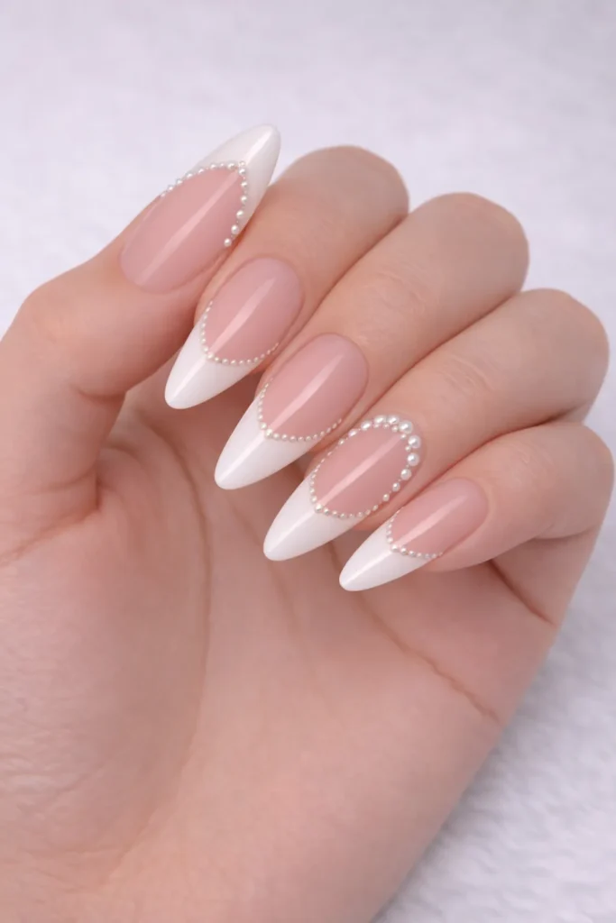 white nail tips, pearl accents, manicure