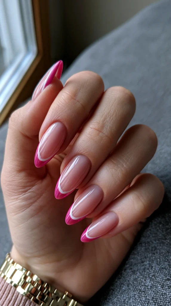 pink French tips, manicure on a female hand